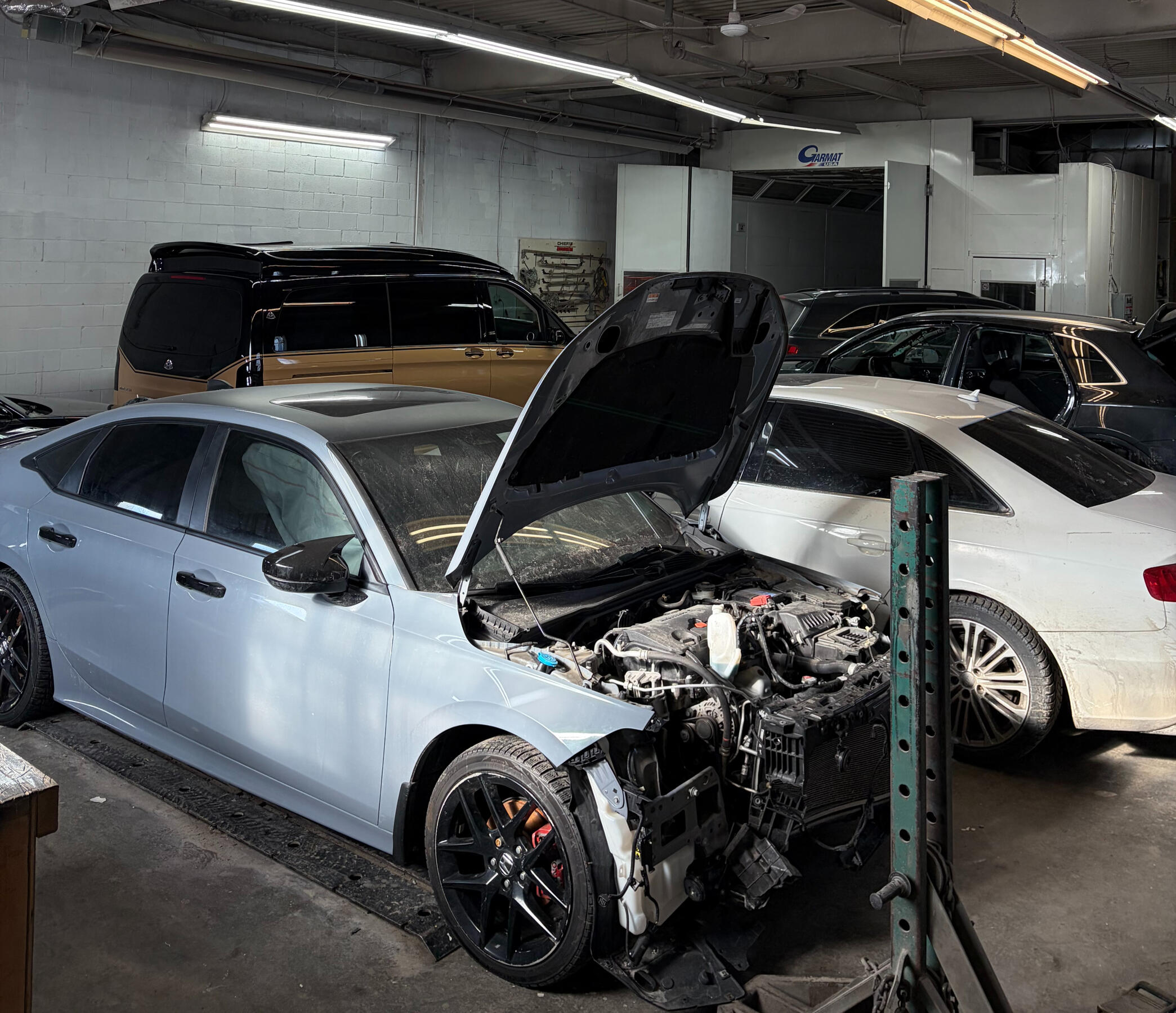 Professional collision repair and frame straightening at Etobicoke Humber Collision shop located at 27 Haas Rd Unit A. Insurance approved auto body repair facility serving Etobicoke and GTA.